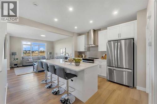 212 Edgefield Bay, Strathmore, AB - Indoor Photo Showing Kitchen With Stainless Steel Kitchen With Upgraded Kitchen