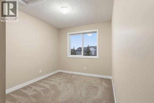 71 Panatella Hill Nw, Calgary, AB - Indoor Photo Showing Other Room