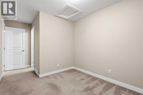 71 Panatella Hill Nw, Calgary, AB - Indoor Photo Showing Other Room