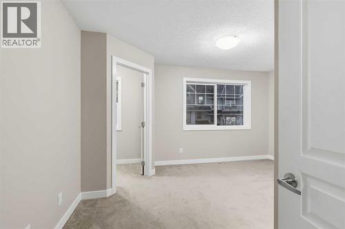 71 Panatella Hill Nw, Calgary, AB - Indoor Photo Showing Other Room