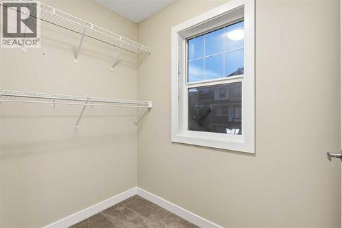 71 Panatella Hill Nw, Calgary, AB - Indoor With Storage