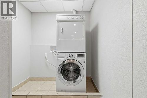 71 Panatella Hill Nw, Calgary, AB - Indoor Photo Showing Laundry Room