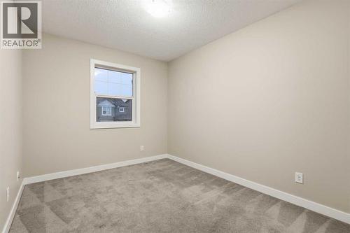 71 Panatella Hill Nw, Calgary, AB - Indoor Photo Showing Other Room