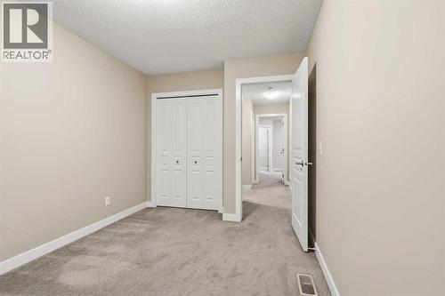 71 Panatella Hill Nw, Calgary, AB - Indoor Photo Showing Other Room