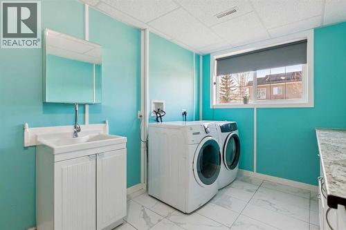 100B Westview Drive, Nanton, AB - Indoor Photo Showing Laundry Room