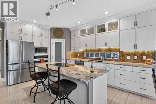 14 Christie Estate Terrace Sw, Calgary, AB - Indoor Photo Showing Kitchen With Upgraded Kitchen