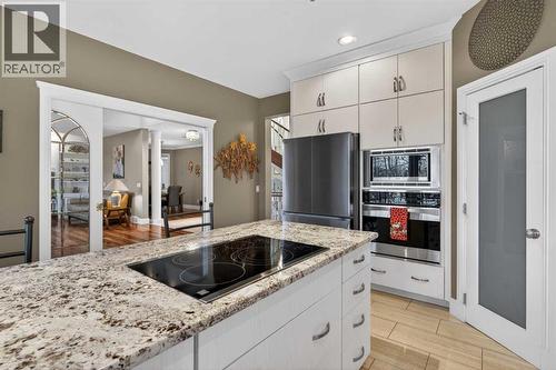 14 Christie Estate Terrace Sw, Calgary, AB - Indoor Photo Showing Kitchen With Upgraded Kitchen