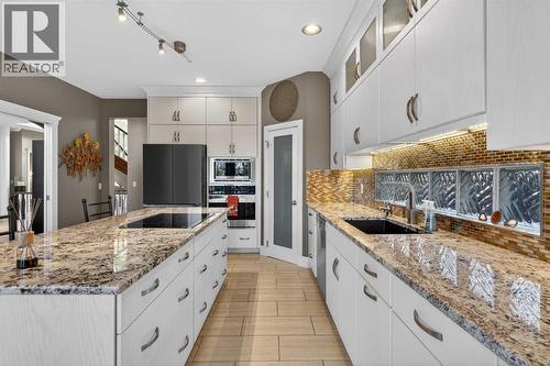 14 Christie Estate Terrace Sw, Calgary, AB - Indoor Photo Showing Kitchen With Upgraded Kitchen