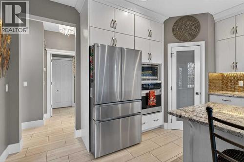 14 Christie Estate Terrace Sw, Calgary, AB - Indoor Photo Showing Kitchen With Upgraded Kitchen