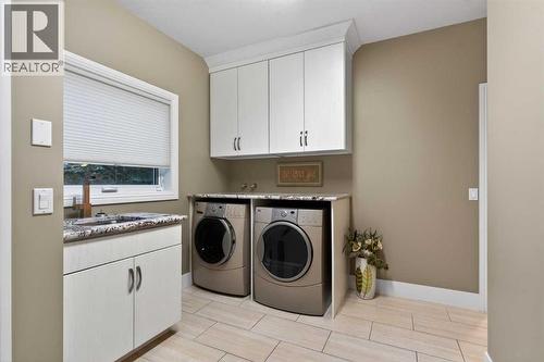 14 Christie Estate Terrace Sw, Calgary, AB - Indoor Photo Showing Laundry Room