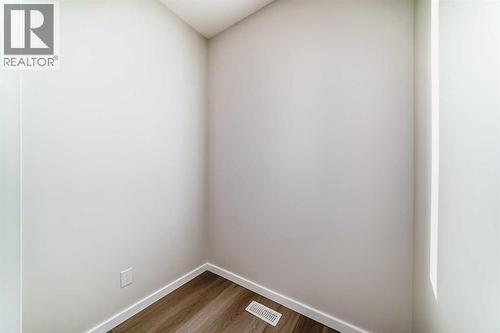 PLEASE NOTE: Photos are of a DIFFERENT Spec Home of the same model – fit and finish may differ. Interior selections and floorplans shown in photos - 158 Bartlett Crescent Se, Calgary, AB - Indoor Photo Showing Other Room