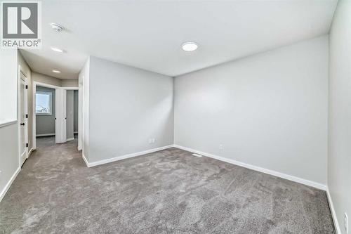 PLEASE NOTE: Photos are of a DIFFERENT Spec Home of the same model – fit and finish may differ. Interior selections and floorplans shown in photos - 158 Bartlett Crescent Se, Calgary, AB - Indoor Photo Showing Other Room