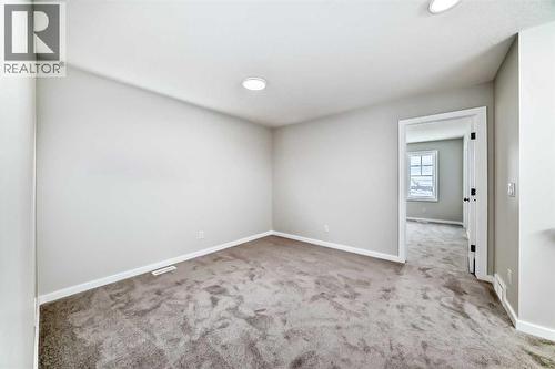 PLEASE NOTE: Photos are of a DIFFERENT Spec Home of the same model – fit and finish may differ. Interior selections and floorplans shown in photos - 158 Bartlett Crescent Se, Calgary, AB - Indoor Photo Showing Other Room