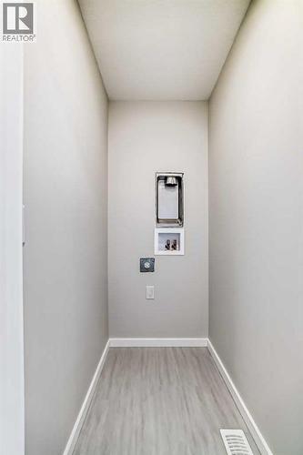 PLEASE NOTE: Photos are of a DIFFERENT Spec Home of the same model – fit and finish may differ. Interior selections and floorplans shown in photos - 158 Bartlett Crescent Se, Calgary, AB - Indoor Photo Showing Other Room