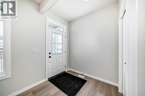 PLEASE NOTE: Photos are of a DIFFERENT Spec Home of the same model – fit and finish may differ. Interior selections and floorplans shown in photos - 158 Bartlett Crescent Se, Calgary, AB - Indoor Photo Showing Other Room