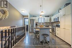 Updated kitchen with stainless steel appliances - 