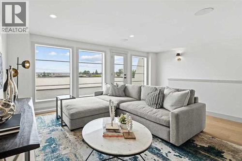 Photo is from a similar past project - 2533 2 Avenue Nw, Calgary, AB - Indoor Photo Showing Living Room