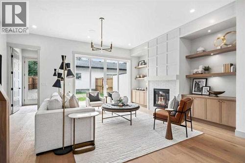 Photo is from a similar past project - 2533 2 Avenue Nw, Calgary, AB - Indoor With Fireplace