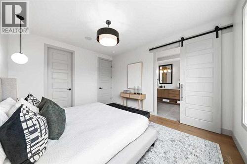 Photo is from a similar past project - 2533 2 Avenue Nw, Calgary, AB - Indoor Photo Showing Bedroom