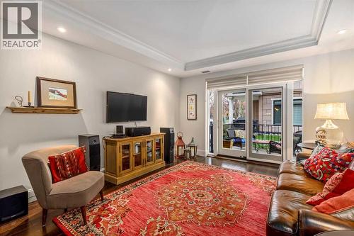 105, 121 Quarry Way Se, Calgary, AB - Indoor Photo Showing Living Room