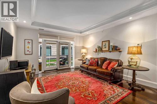 105, 121 Quarry Way Se, Calgary, AB - Indoor Photo Showing Living Room