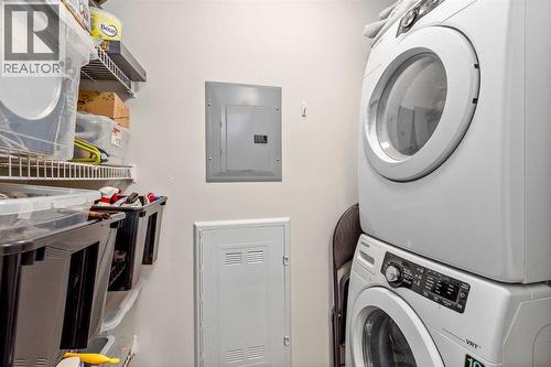105, 121 Quarry Way Se, Calgary, AB - Indoor Photo Showing Laundry Room