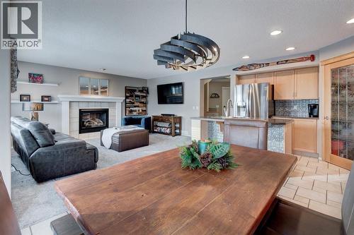 162 Somerside Crescent Sw, Calgary, AB - Indoor Photo Showing Other Room With Fireplace