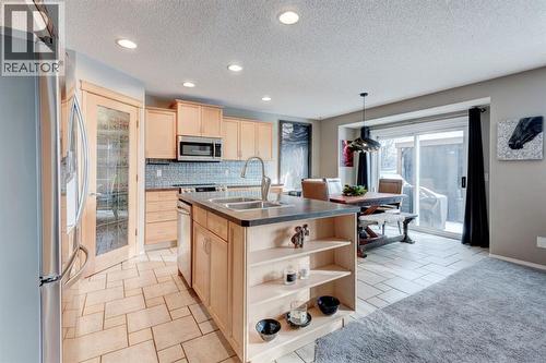 162 Somerside Crescent Sw, Calgary, AB - Indoor Photo Showing Kitchen With Double Sink