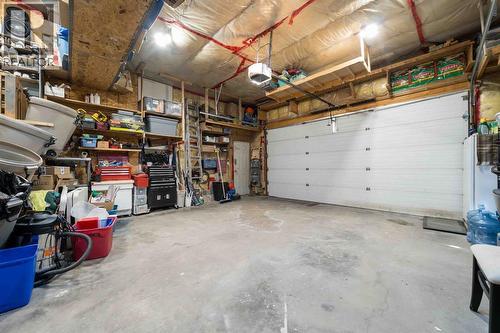 110 Redcliff Way Sw, Redcliff, AB - Indoor Photo Showing Garage