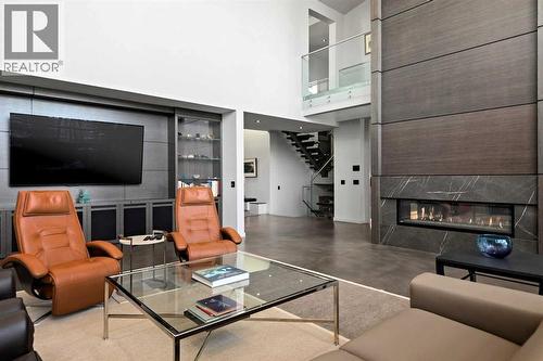 25 Posthill Drive Sw, Calgary, AB - Indoor With Fireplace