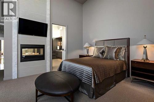 25 Posthill Drive Sw, Calgary, AB - Indoor Photo Showing Bedroom