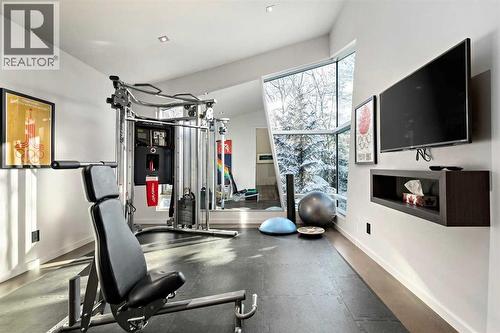 25 Posthill Drive Sw, Calgary, AB - Indoor Photo Showing Gym Room