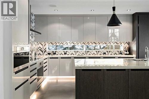 25 Posthill Drive Sw, Calgary, AB - Indoor Photo Showing Kitchen With Upgraded Kitchen