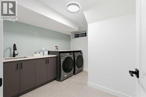 4904 Valiant Drive Nw, Calgary, AB - Indoor Photo Showing Laundry Room