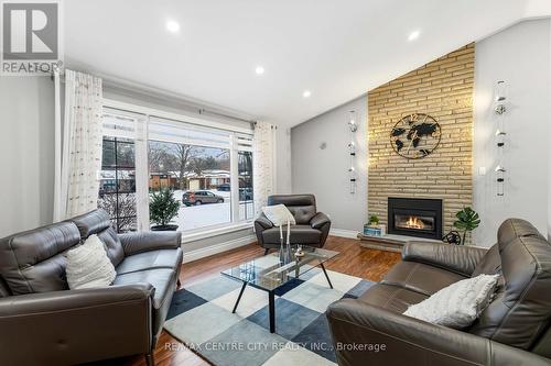 71 Sunray Avenue, London South (South V), ON - Indoor Photo Showing Living Room With Fireplace