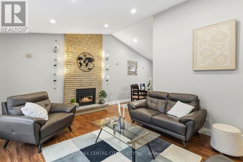 71 Sunray Avenue, London South (South V), ON - Indoor Photo Showing Living Room With Fireplace