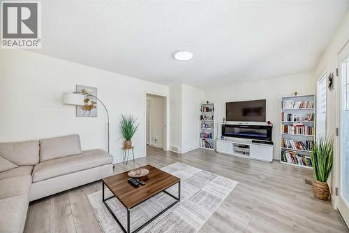 437 Auburn Bay Drive Se, Calgary, AB - Indoor Photo Showing Living Room
