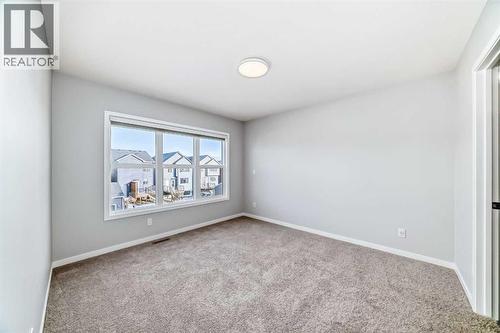 32 Creekview Common Sw, Calgary, AB - Indoor Photo Showing Other Room