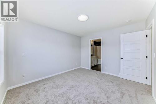 32 Creekview Common Sw, Calgary, AB - Indoor Photo Showing Other Room
