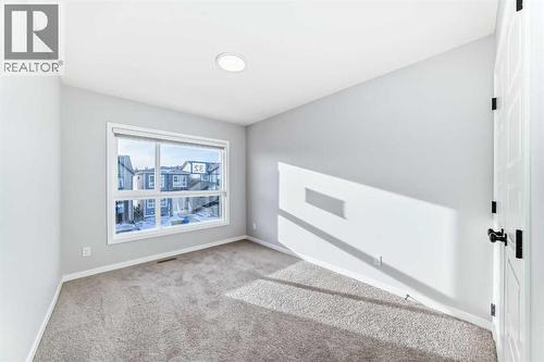32 Creekview Common Sw, Calgary, AB - Indoor Photo Showing Other Room