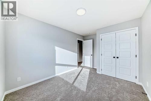 32 Creekview Common Sw, Calgary, AB - Indoor Photo Showing Other Room