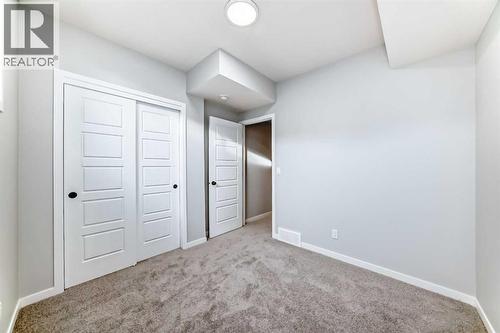 32 Creekview Common Sw, Calgary, AB - Indoor Photo Showing Other Room