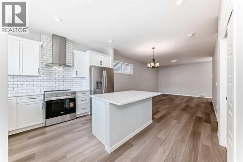 32 Creekview Common Sw, Calgary, AB - Indoor Photo Showing Kitchen With Upgraded Kitchen