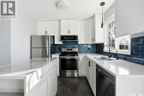 3826 Cormorant Drive E, Regina, SK - Indoor Photo Showing Kitchen With Stainless Steel Kitchen With Double Sink With Upgraded Kitchen
