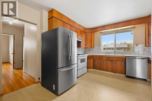 2719 Chalice Road Nw, Calgary, AB - Indoor Photo Showing Kitchen