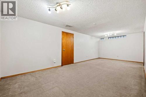 2719 Chalice Road Nw, Calgary, AB - Indoor Photo Showing Other Room