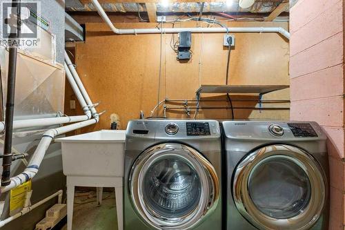 2719 Chalice Road Nw, Calgary, AB - Indoor Photo Showing Laundry Room