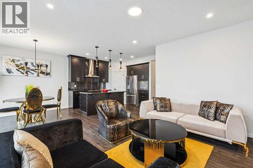 86 Creekside Way Sw, Calgary, AB - Indoor Photo Showing Living Room