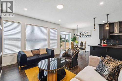 86 Creekside Way Sw, Calgary, AB - Indoor Photo Showing Living Room