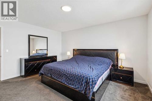 86 Creekside Way Sw, Calgary, AB - Indoor Photo Showing Bedroom